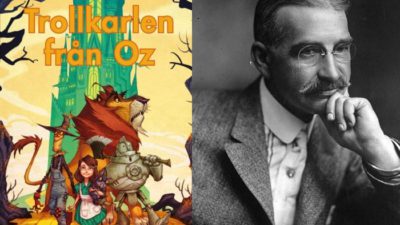 Frann Baum sitter med hakan i handen. Bilden är svartvit, och han har slätt, kammat hår och runda glasögon.